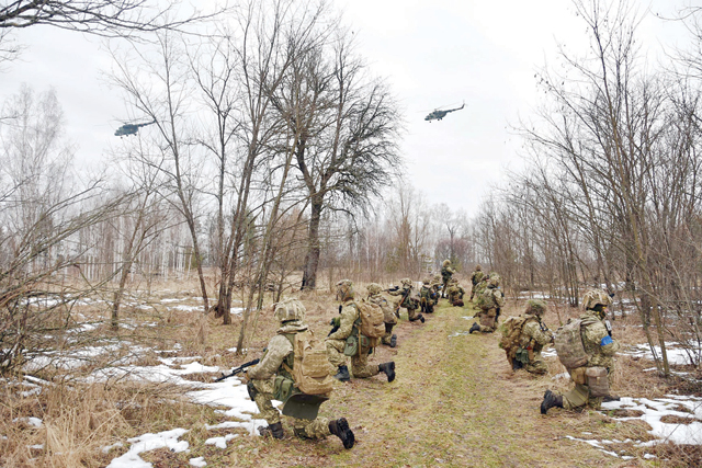 This handout photo released on Monday by the press service of the General Staff of the Ukrainian Armed Forces in an unknown location of Ukraine shows Ukrainian soldiers taking part in exercises (AFP photo)