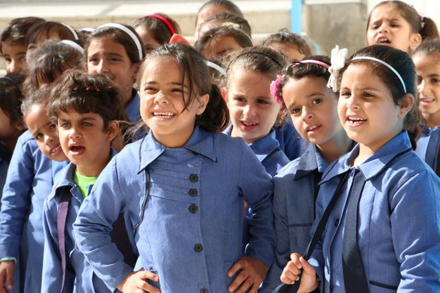 In this undated photo, Syrian refugee children are seen at a school. UNICEF has stopped a cash assistance programme to these children as a result of dwindling funding  (Photo courtesy of UNICEF)