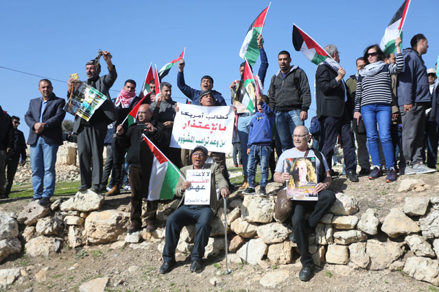 A group of demonstrators stage a protest against US decision to recognise Jerusalem as Israel's capital and to show their support for the Palestinian prisoners in Israeli jails at Nebi Saleh village of Ramallah, West Bank, on Saturday (Anadolu Agency photo)