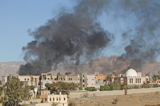 Smoke rises after an air strike on the military site in Sanaa, Yemen, on Thursday (Reuters photo)