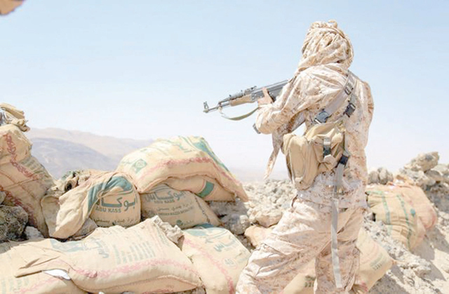 A fighter loyal to Yemen's Saudi-backed government mans a position near the frontline facing Iran-backed Houthi rebels in the country's northeastern province of Marib, on October 17, 2021 (AFP photo)