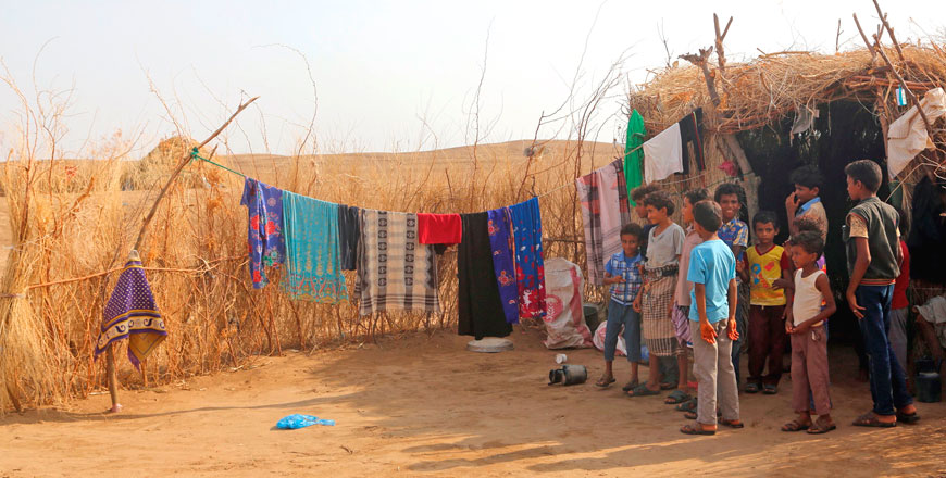 Yemeni youth, displaced from the town of Dirhami, are photographed in a temporary shelter in the city of Mansouriya, in the Hodeida province, on Friday (AFP photo)