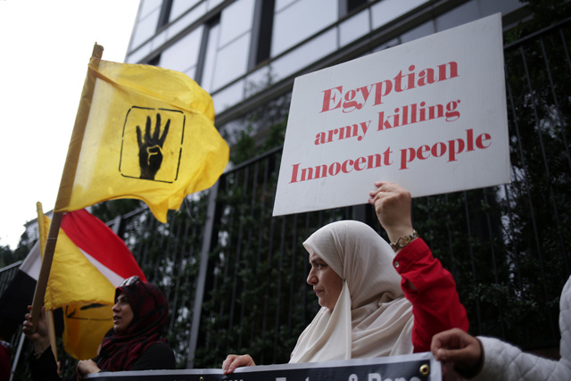 Egyptian-Americans and opponents of Egyptian President Abdel Fattah Sisi hold a protest outside the UN headquarters during the United Nations General Assembly in Manhattan, New York, US, on Tuesday (Reuters photo)