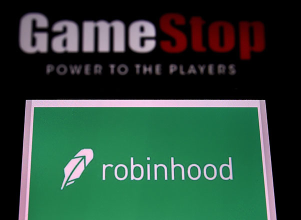  This photo illustration taken on January 28, 2021 shows the logos of video grame retail store GameStop and trading application Robinhood in a computer and on a mobile phone in Arlington, Virginia. (AFP file photo)