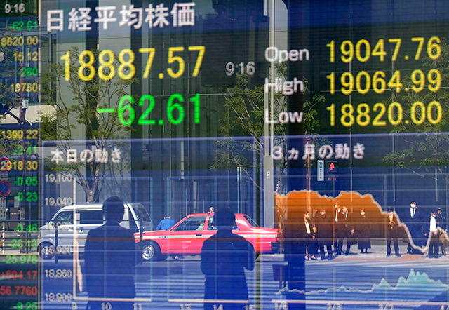 A quotation board displays share prices of the Tokyo Stock Exchange in Tokyo on April 8, Wednesday (AFP photo)
