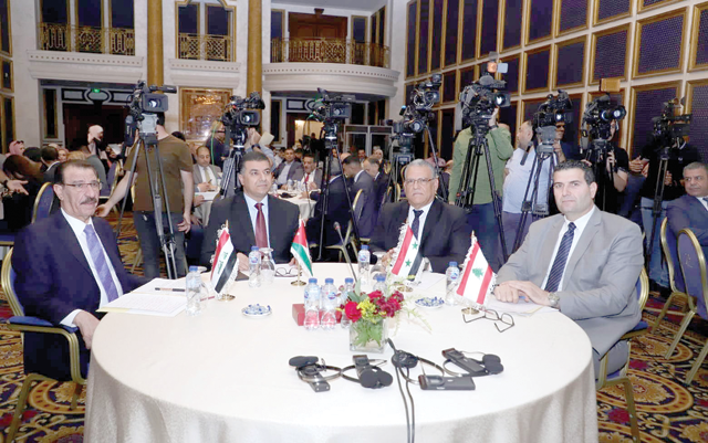 Agriculture Minister Khalid Hneifat, Syrian Agriculture Minister Muhammad Qatna, Lebanese Agriculture Minister Abbas Hajj and Iraqi Agriculture Minister Muhammad Khafaji during a meeting in Amman on Sunday (Petra photo)