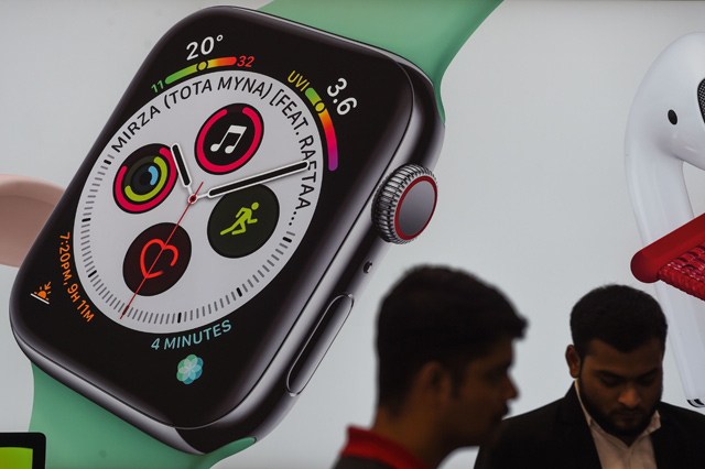 Visitors are seen at a newly launched Apple store in Mumbai, on August 2, 2019 (AFP file photo)