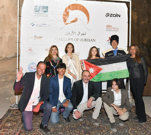 Top: Their Royal Highnesses Prince Ali and Princess Rym pose for a photo with the Jordanian team. Above: Jordan’s equestrian team members at the end of their race in front of the Treasury, Petra’s iconic façade (Photos courtesy of Batool Abdallat)