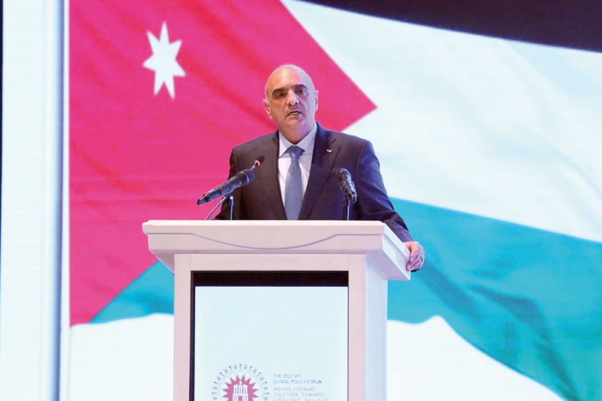 Prime Minister Bisher Al Khasawneh addresses the Alliance for Financial Inclusion’s 2022 Global Policy Forum at the Dead Sea on Wednesday  (Petra photo)