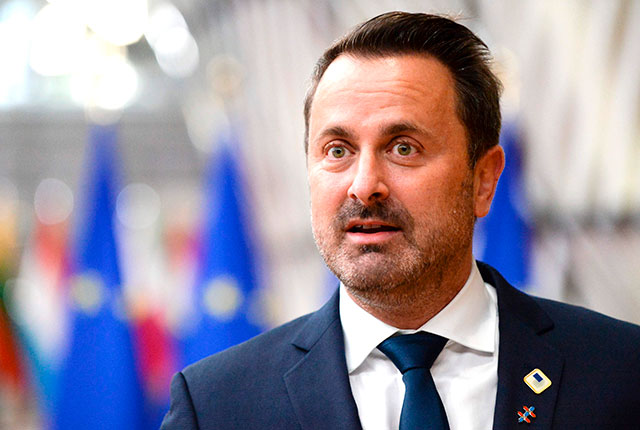 Luxembourg Prime Minister Xavier Bettel arrives ahead of a two days European Union summit at the European Council Building in Brussels, on Thursday (AFP photo)