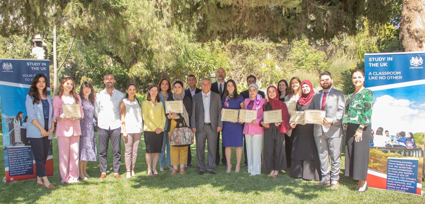British Ambassador to Jordan Bridget Brind poses for a photo with the new cohort of Chevening Scholars from Jordan (Petra photo)
