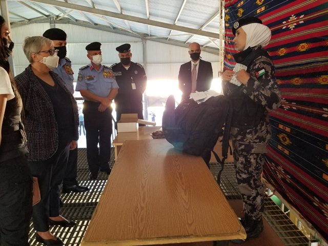 Canada’s Ambassador to Jordan Donica Pottie listens to a presentation by a police officer during the graduation of officers trained to instruct colleagues in the Public Security Directorate (Photo courtesy of Canadian embassy)