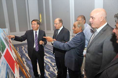Chinese Ambassador to Jordan Pan Weifang (left) with senior officials during a seminar held to mark the 70th anniversary of the founding of the People’s Republic of China on Wednesday (Petra photo)