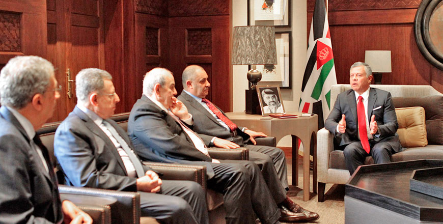 His Majesty King Abdullah meets with a delegation from the Arab and International Relations Council at Al Husseiniya Palace on Sunday (Photo courtesy of Royal Court)