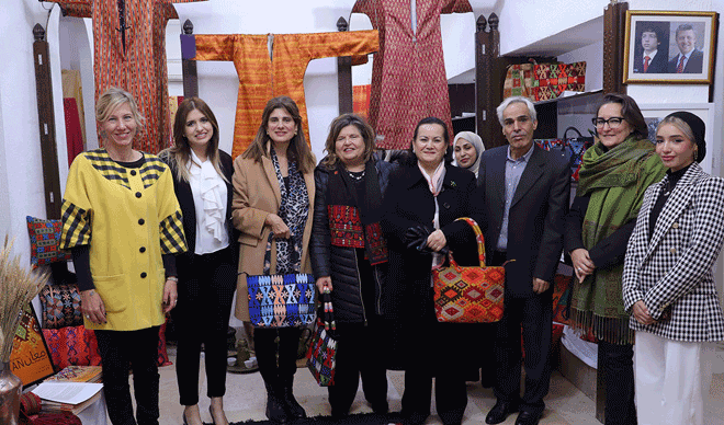 HRH Princess Sana Asem, HH Princess Dina Mired, Swedish Ambassador to Jordan Alexandra Rydmark and guests pose for a photo during the opening of an exhibition featuring embroidery from Jordan’s southern governorate of Maan at the Jordan Craft Centre Al Aydi on Tuesday (Petra photo)