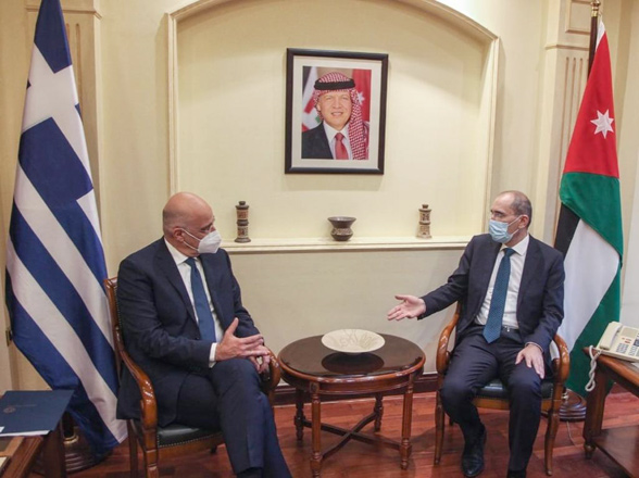 Deputy Prime Minister and Foreign Minister Ayman Safadi meets with Greek Foreign Minister Nikos Dendias on Tuesday (Photo courtesy of the Foreign Ministry)