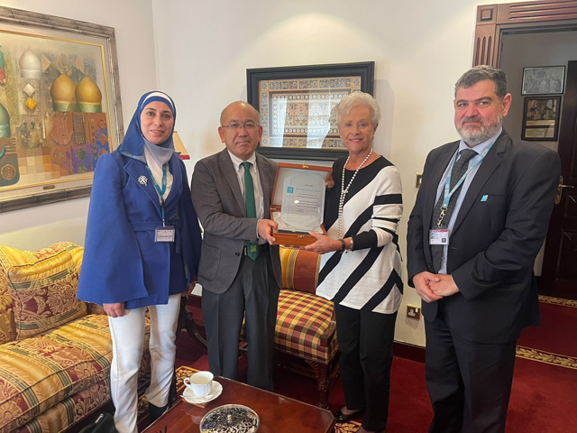 HRH Princess Muna receives a plaque from an UNRWA delegation in honour of her work at the local, regional and international levels on Sunday (Petra photo)