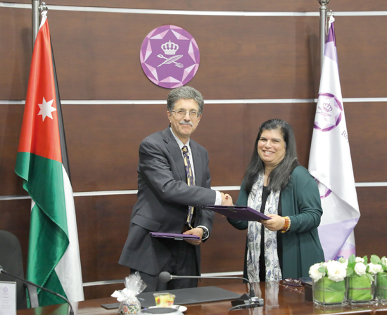 HRH Princess Sumaya and Amir Mohagheghi, executive director of the Cooperative Monitoring Centre- SNL, during a signing ceremony on Sunday (Petra photo)
