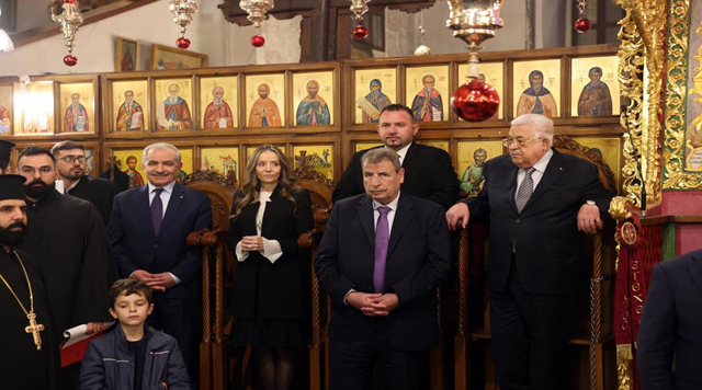 HRH Princess Miriam Ghazi, Palestinian President Mahmoud Abbas and other guests attend the Eastern Orthodox Christmas Mass at the Church of the Nativity in West Bank city of Bethlehem on Friday evening  (Petra photo)