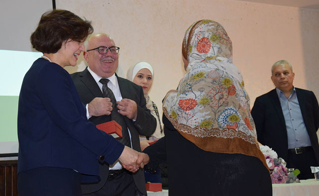 The Social Development Ministry on Saturday presented 35 underprivileged families with keys of housing units out of 94 in the central region (Petra photo)