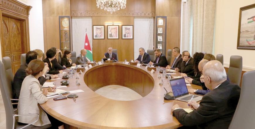 Prime Minister Bisher Khasawneh welcomes head of the International Monetary Fund (IMF) mission to Jordan, Ron van Rooden, and his delegation on Tuesday (Petra photo)