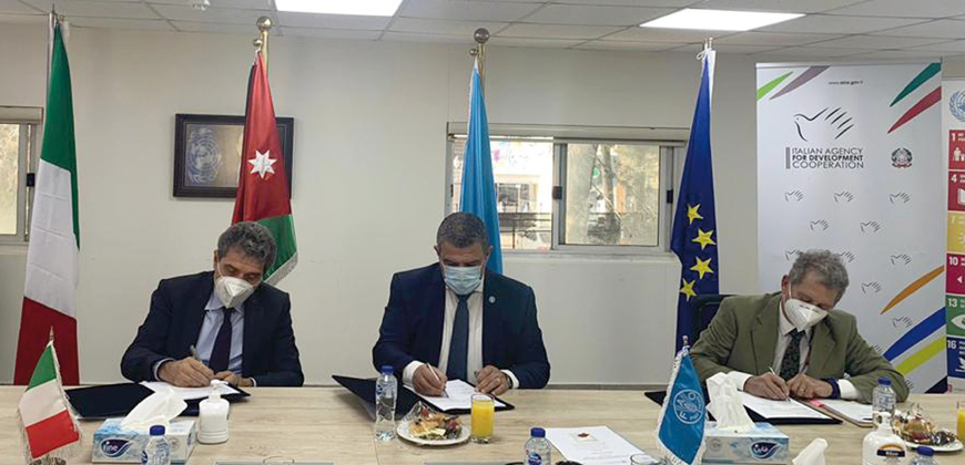 Italy’s Ambassador to Jordan Fabio Cassese and FAO Representative in Jordan Nabil Assaf sign an agreement during a ceremony attended by the head of Italian Agency for Development Cooperation in Amman, Emilio Cabasino, on Sunday (Photo courtesy of FAO)