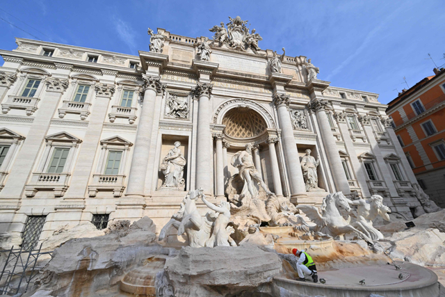 A person is seen working at the renovation of the Trevi Fountain on Saturday (AFP photo)