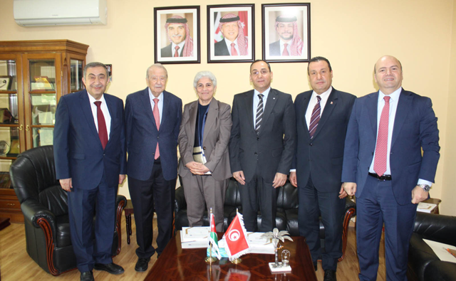 President of the Jordanian Businessmen Association Hamdi Tabbaa and Tunisian Ambassador to Jordan Moufida Zribi on Sunday discuss ways to enhance Arab partnerships and support inter-Arab investments (Petra photo)