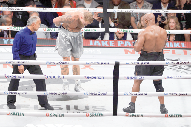 Jake Paul bows to Mike Tyson during their heavyweight bout at AT&T Stadium on Saturday in Arlington, Texas (AFP photo)