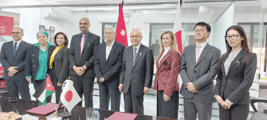 Japan’s Ambassador to Jordan Okuyama Jiro, President of the Board of Trustees of JMAP Michael Al Sayegh and guests pose for  a photo during a ceremony on Monday (Photo courtesy of Japanese embassy)