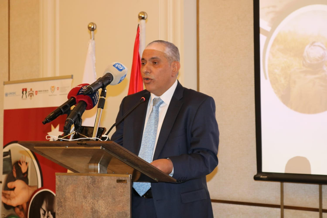 Deputising for Minister of Justice Ahmad Ziadat, Secretary-General for Judicial Affairs Saed Louzi speaks during the launch of the ‘National Referral Mechanism and Standard Operating Procedures in Dealing with Human Trafficking Cases’ in Amman on Monday (Photo courtesy of Justice Ministry)