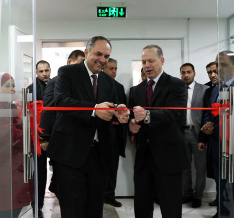   Minister of Justice Bassam Talhouni (left) and USAID Mission Director Jim Barnhart (right) launch the Government Services Complex at the New Amman Palace of Justice on Saturday (Photo courtesy of Ministry of Justice)