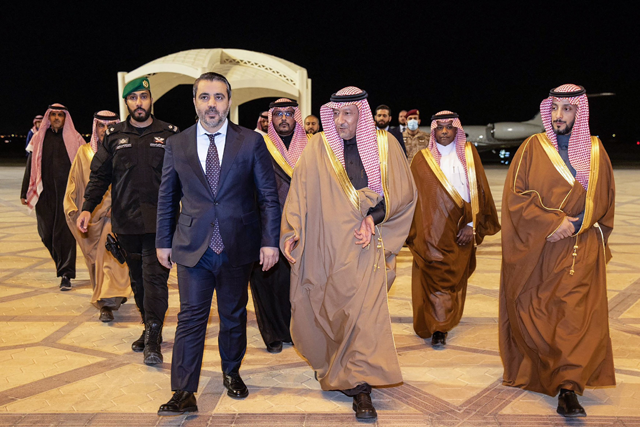 A handout photo provided by the Saudi ministry of foreign affairs, shows newly appointed Syrian Foreign Minister Assaad Al Shibani (centre-left) welcomed by Saudi Vice Minister of Foreign Affairs Waleed Al khereiji  upon his arrival in Riyadh on Wednesday  (AFP photo)