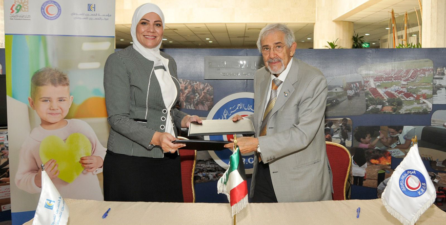 The King Hussein Cancer Foundation signs a memorandum of understanding with the Kuwait Red Crescent Society on Wednesday (Petra photo)