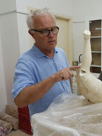 Michael Morris at ACOR’s lab reconstructing ancient sculptures of Aphrodite in November 2018 (Photo courtesy of Barbara Porter)