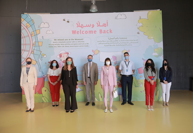 US Chargé d’Affaires Karen Sasahara poses for a group photo during the reopening of the interactive, educational exhibit ‘The Flow Wall’ at the Children’s Museum-Jordan (Photo courtesy of Children’s Museum-Jordan)