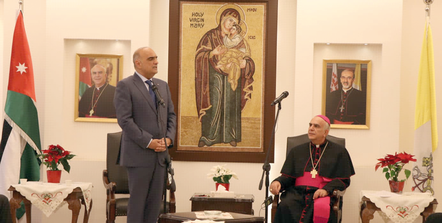 Prime Minister Bisher Khasawneh with Latin Patriarchal Vicar for Jordan Bishop Jamal Daibes during a meeting at the Patriarchate in Amman on Monday (Petra photo)