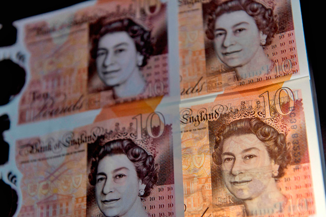 In this photo, British ten pound sterling notes are arranged for a picture in London, on December 14, 2017 (AFP file photo)