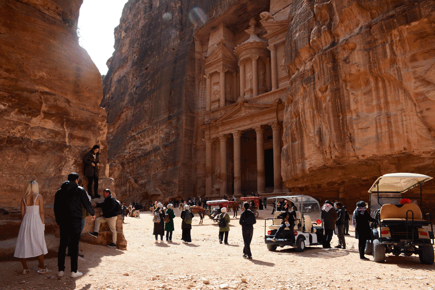 Tourists are seen at the rose-red city of Petra, some 220 kilometres south of Amman, in this photo taken on February 14, 2020 (Photo by Amjad Ghsoun)