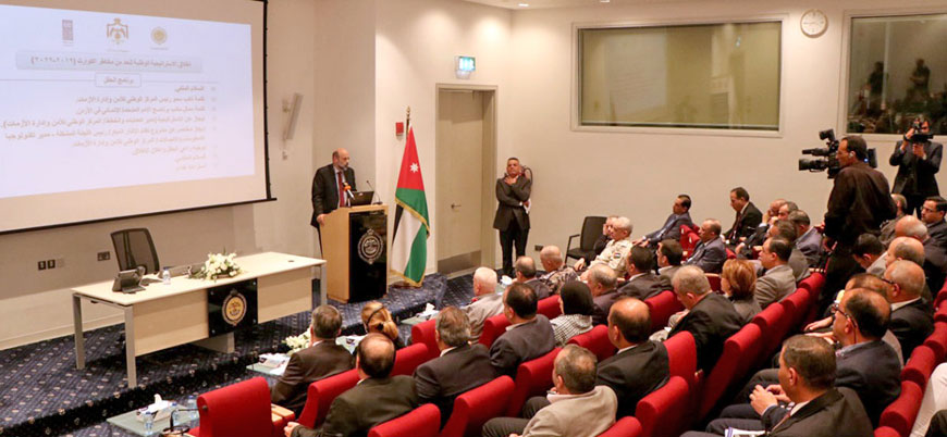 Prime Minister Omar Razzaz speaks during a ceremony to launch Jordan’s new strategy for disaster risk reduction on Tuesday (Petra photo)