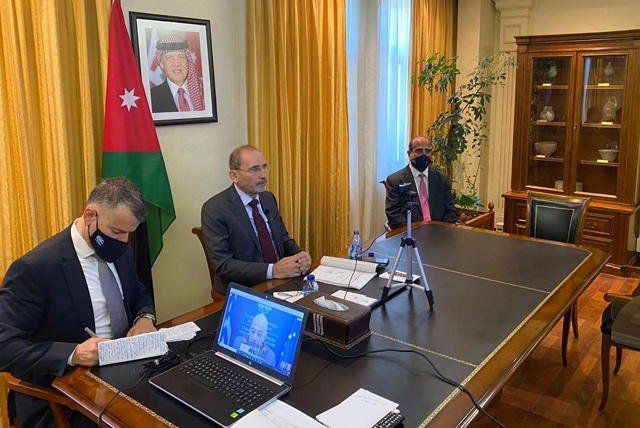   Foreign Minister Ayman Safadi during a virtual meeting with his Greek counterpart Nikos Dendias and his Cypriot counterpart Nikos Christodoulides on Wednesday (Petra photo)