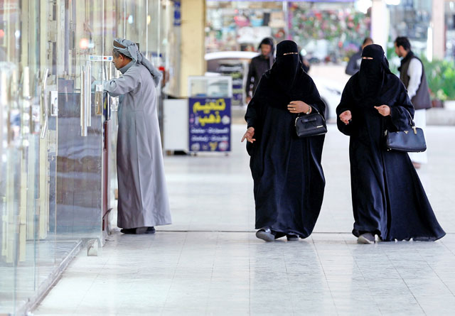 Women walk at a market in Riyadh, Saudi Arabia, on Wednesday (Reuters photo)