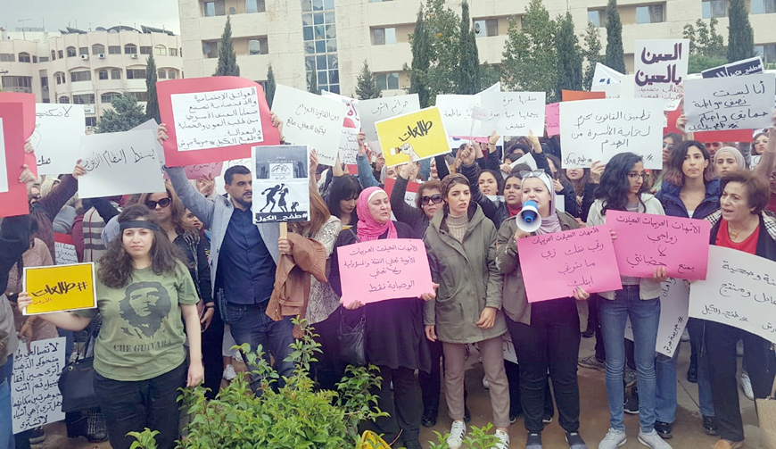 Jordanians stage a sit-in near the Prime Ministry on Saturday to call for better legal and social protection for women subjected to domestic violence  (Photo by Rana Husseini)