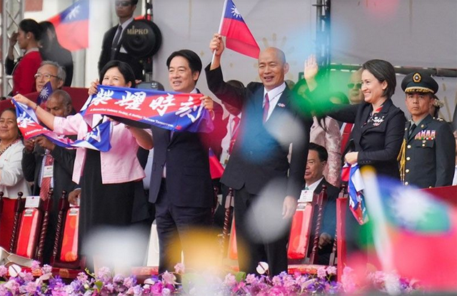 Taiwan's President Lai Ching-te (2nd L), First Lady Wu Mei-ju (L), Taiwan's Vice President Hsiao Bi-khim (R) and Taiwan Legislative Yuan president Han Kuo-yu wave during National Day celebrations in front of the Presidential Office in Taipei on October 10, 2024 (AFP photo)