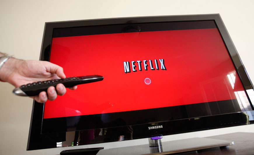 In this July 20, 2010 file photo, a person uses Netflix in Palo Alto, California. Netflix on Tuesday said it will expand into Japan beginning September 2 to give the Internet video service its first presence in Asia (AP photo)