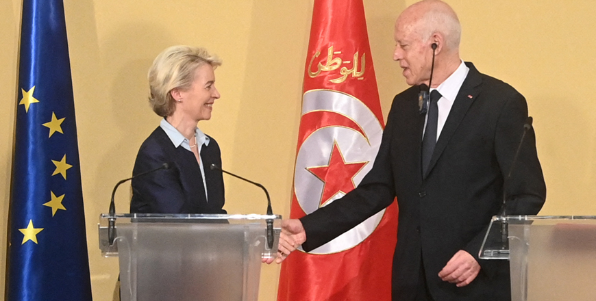 European Commission President Ursula Von der Leyen shakes the hand of Tunisia's President Kais Saied after a press briefing at the presidential palace in Tunis on Sunday (AFP photo)
