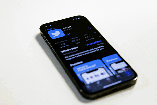 In this photo illustration, the Twitter app is seen in the Apple App Store on an Apple iPhone 13 Pro in Washington, DC, on Monday (AFP photo)