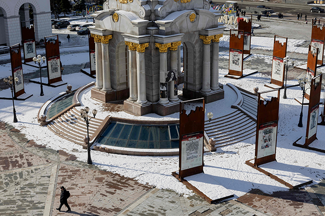 A man walks at Independence Square in Kyiv today, amid the Russian invasion of Ukraine (AFP photo)