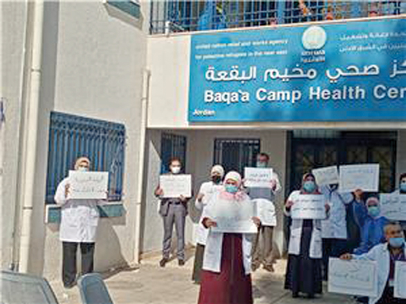 UNRWA workers protest outside of the Baqa’a Camp Health Centre  (Photo courtesy of Jordan Labour Watch)
