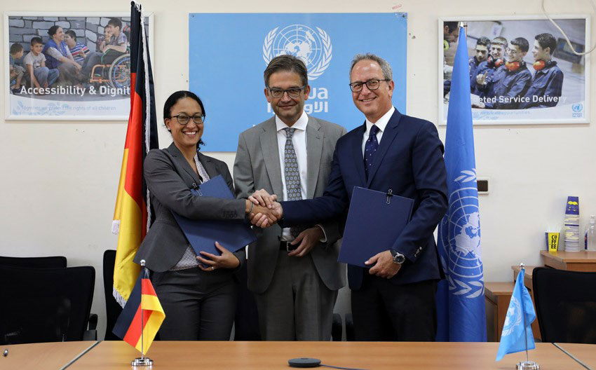 From left: Michele Diekmann, KfW Head of Division-Crisis Prevention and Response, Middle East; Oliver Owcza, Head of the German Representative Office in Ramallah; and Karim Amer, UNRWA Director of Partnerships on July 22, at the UNRWA Office in East Jerusalem (Photo courtesy of UNRWA)